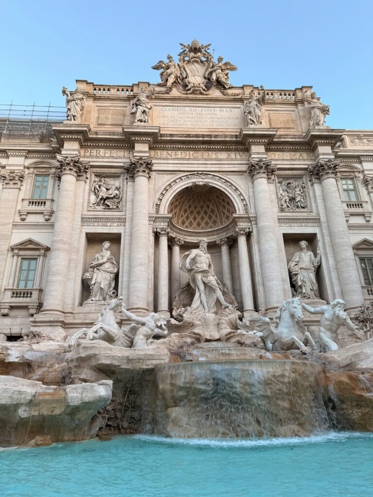 Stunning view of the historic Trevi Fountain in Rome, capturing its baroque architecture and cascading waters.