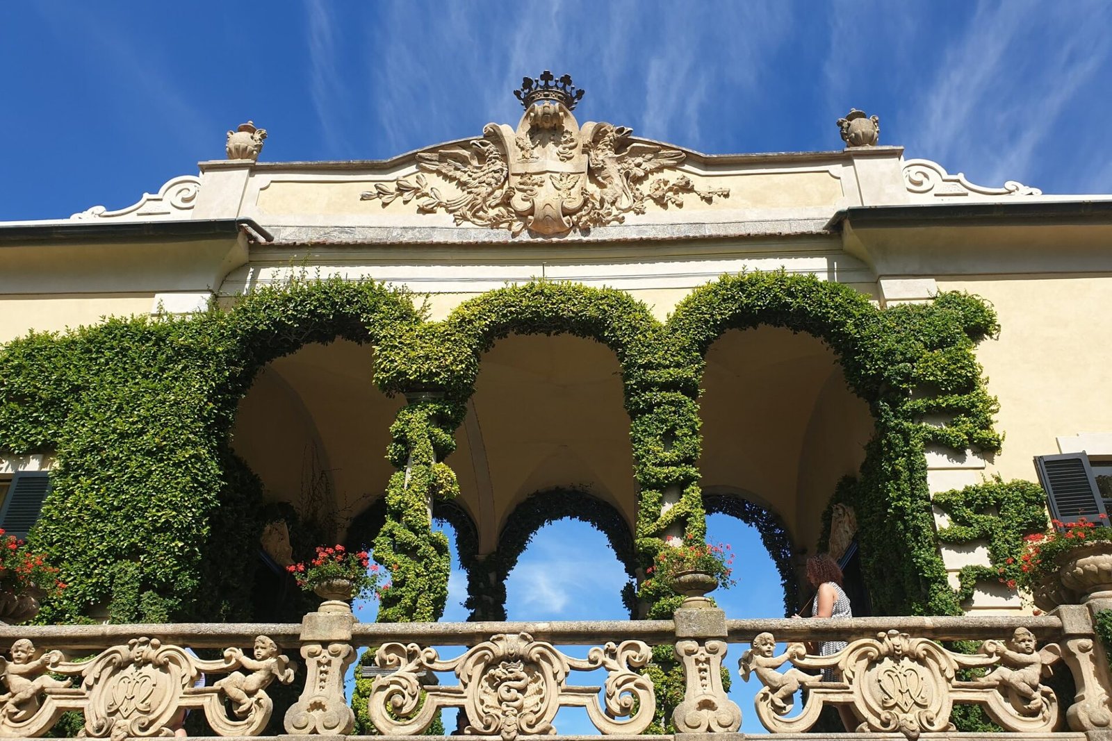 Lake Como Villas for Weddings & Photoshoots: Balbianello, Carlotta, Villa d’Este and More The ivy-covered loggia of Villa del Balbianello with open arches over Lake Como