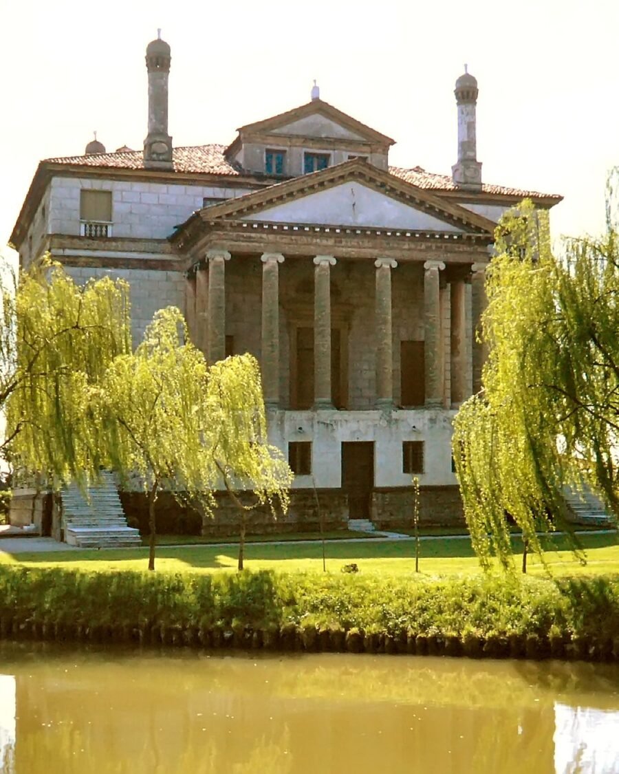 Palladio’s Villa Foscari “La Malcontenta” reflected in the Brenta canal between willows