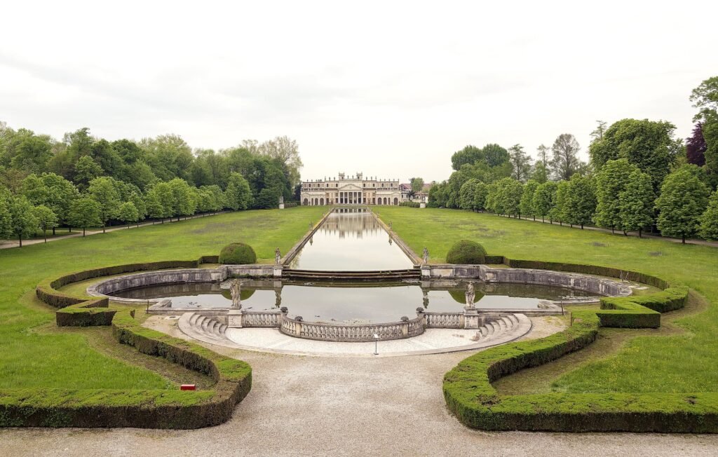 The Most Beautiful Villas in Italy for Photoshoots, Weddings & Events (2026 Guide) Villa Pisani at Stra across its long reflecting pool on the Riviera del Brenta